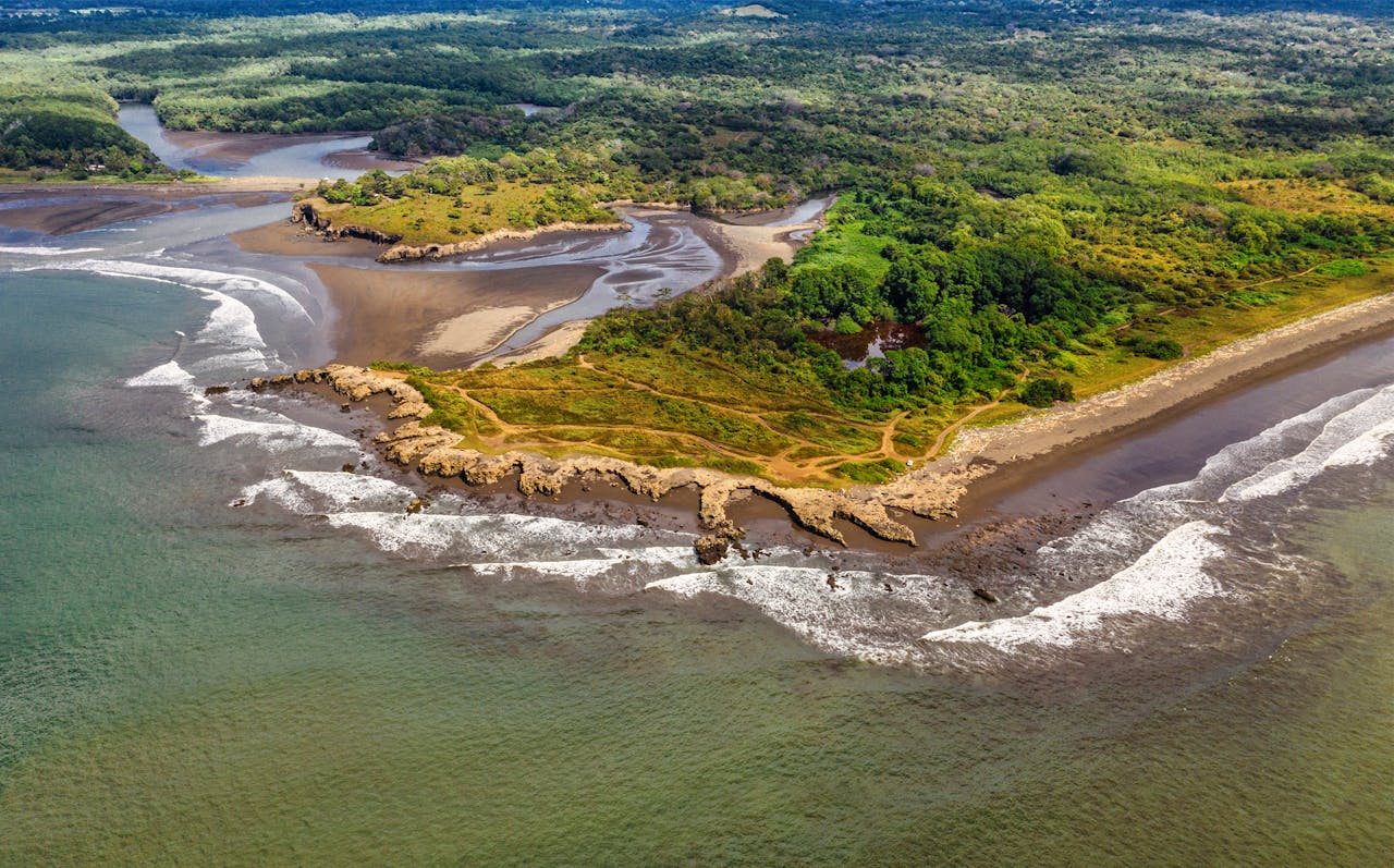 services-02 Stunning aerial shot of the lush coastline in Puntarenas, Costa Rica.